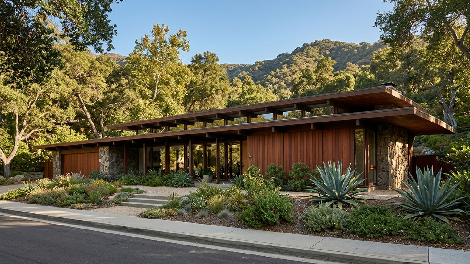 Mid-Century Modern home with low-slung roof, clerestory windows, exposed beams, and stone piers, San Gabriel Valley.